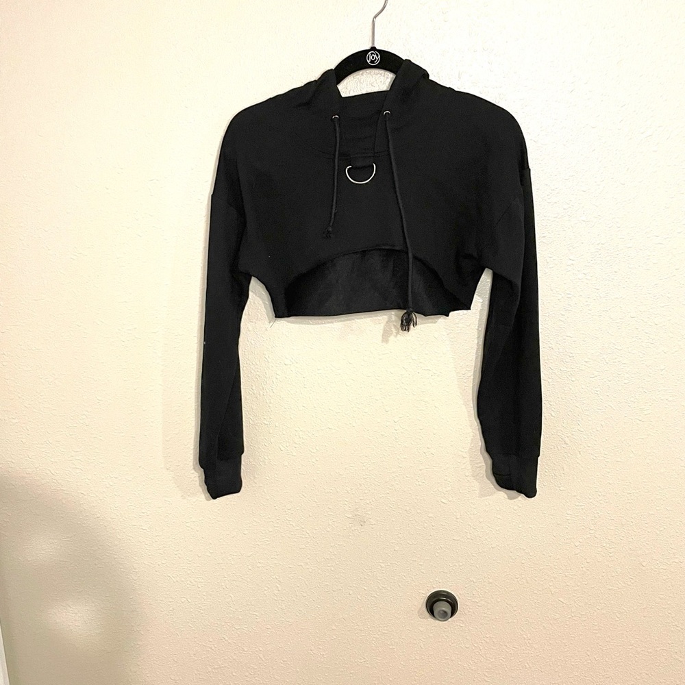 Cropped women’s pullover hoodie.